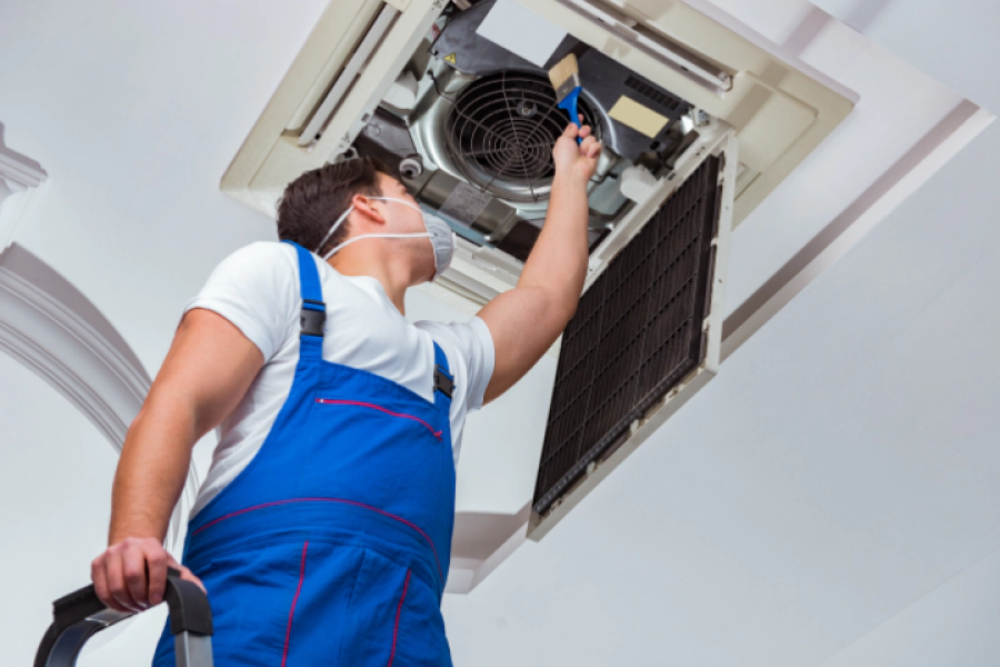 worker-repairing-ceiling-air-conditioning-unit-alexandria-va
